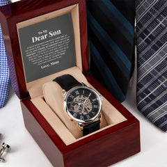 The To My Dear Son Always Remember I Love You - Openwork Watch is a timeless gift. Show him your pride and love with this stunning, high-quality timepiece.